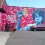 Graphite of a image that says they tried to bury us they didn't know we were seeds.