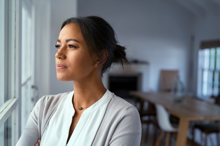 Woman looking out the window.